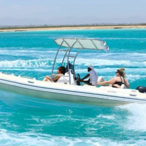 Speed boat trip in hurghada with tourists enjoying the red sea 