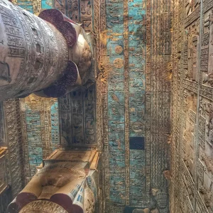 Colorful ceiling and decorated columns inside Dendera Temple, featured in the Abydos and Dendera Temples private tour from Luxor